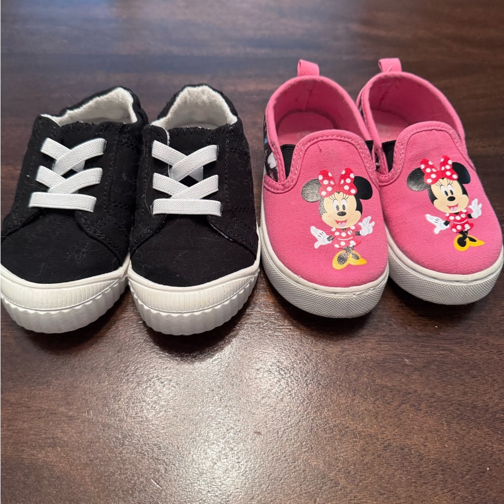 Two pairs of size 7c shoes.